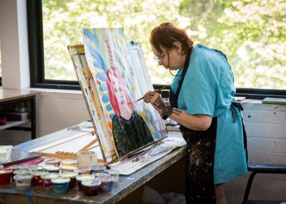 Cathy Staughton working in the Arts Project studio