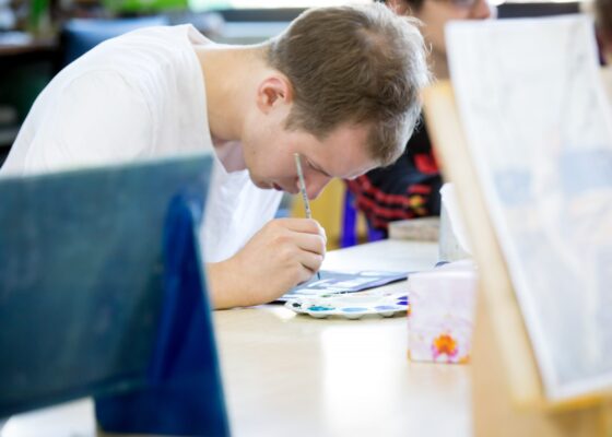 Jordan Dymke working in the Arts Project studio